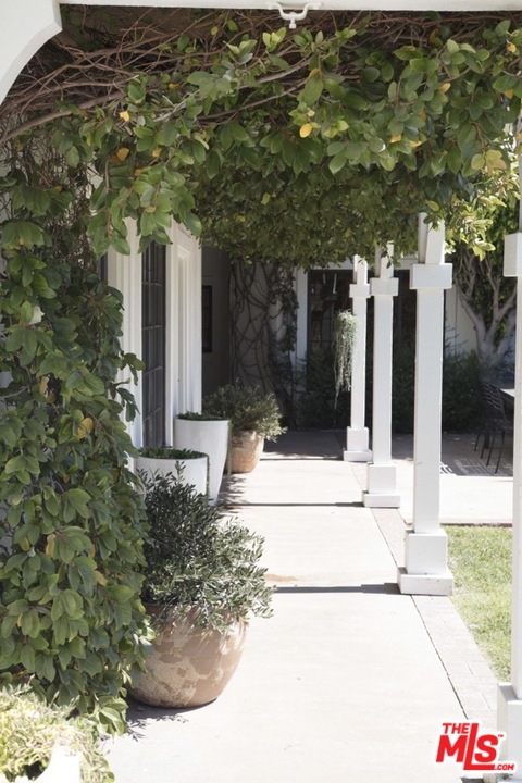 1075 Wallace Ridge Beverly Hills, CA 90210 - Photo 3 of 35 a view of a entrance gate of the house