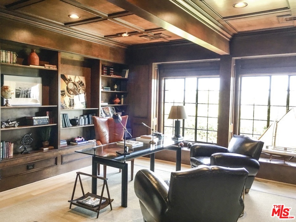 1075 Wallace Ridge Beverly Hills, CA 90210 - Photo 32 of 35 a living room with furniture a window and gym equipment