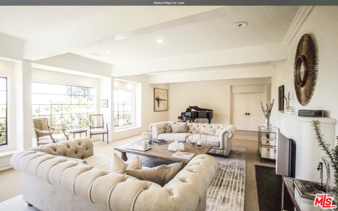 1075 Wallace Ridge Beverly Hills, CA 90210 - Photo 8 of 35 a living room with furniture and a fireplace