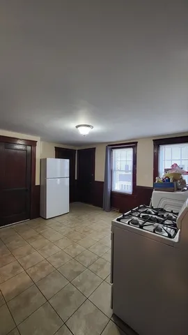 a view of kitchen and sink