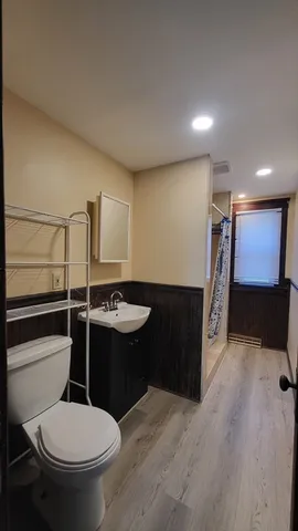 a bathroom with a sink and a toilet