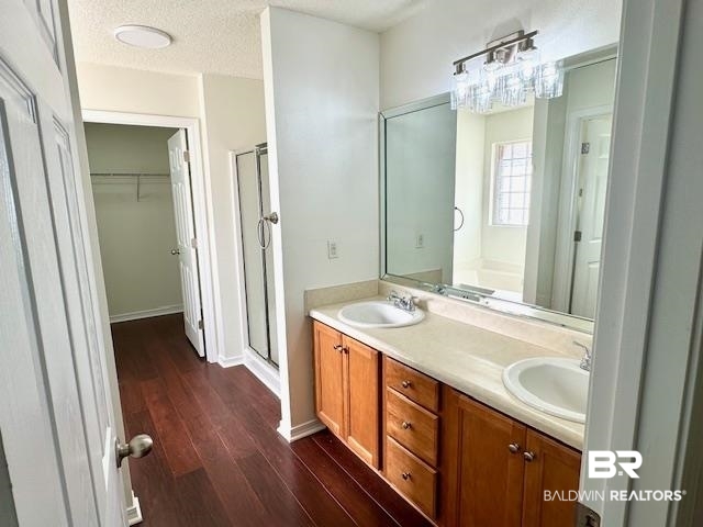 27948 Rileywood Drive Daphne, AL 36526 - Photo 12 of 22 Bathroom featuring double vanities and separate tub and shower