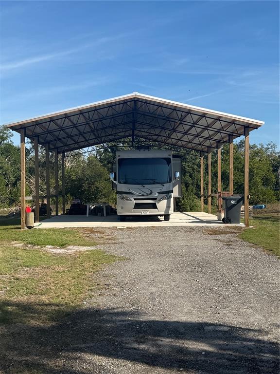 912 Piney Point Road Palmetto, FL 34221 - Photo 4 of 10 a view of a house with backyard porch and sitting area