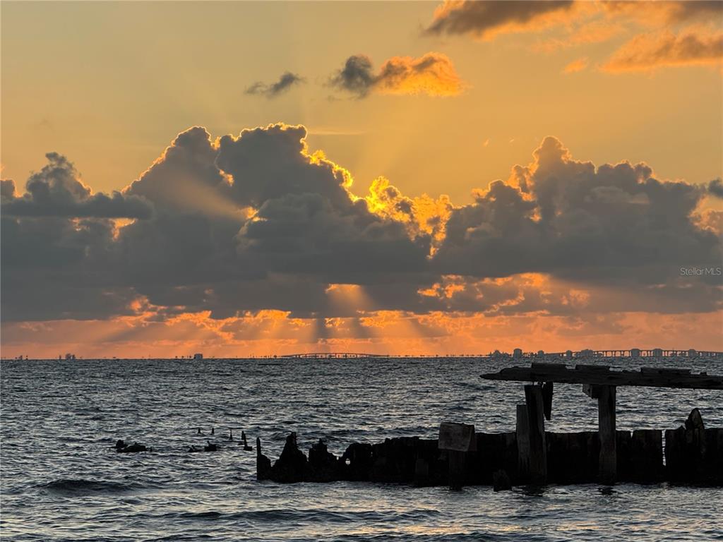 912 Piney Point Road Palmetto, FL 34221 - Photo 7 of 10 a view of ocean with sunset