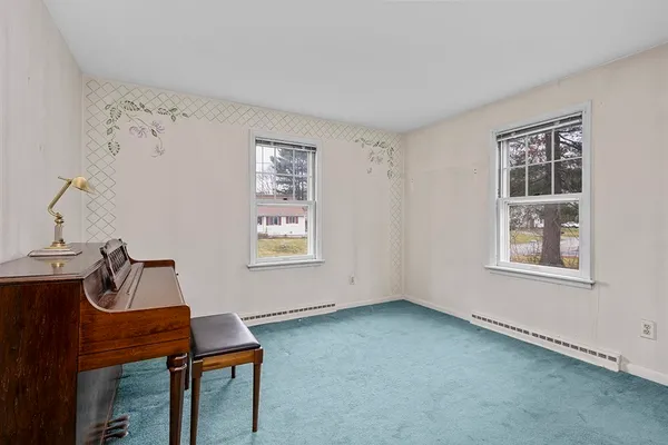 a room with furniture and a window