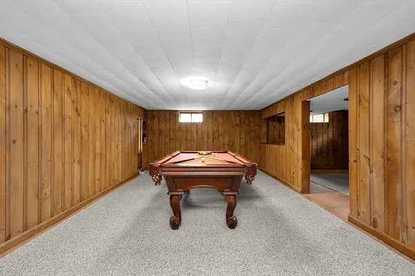 a room with a table and chairs