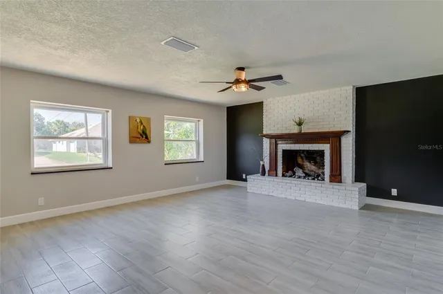 a view of a livingroom with a fireplace