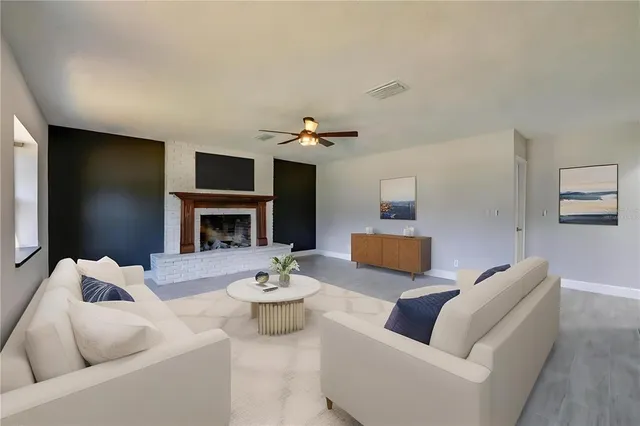 a bedroom with a large bed and a large window