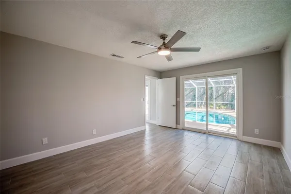 a bathroom with a shower and a toilet