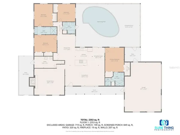 a living room with furniture kitchen view and a wooden floor