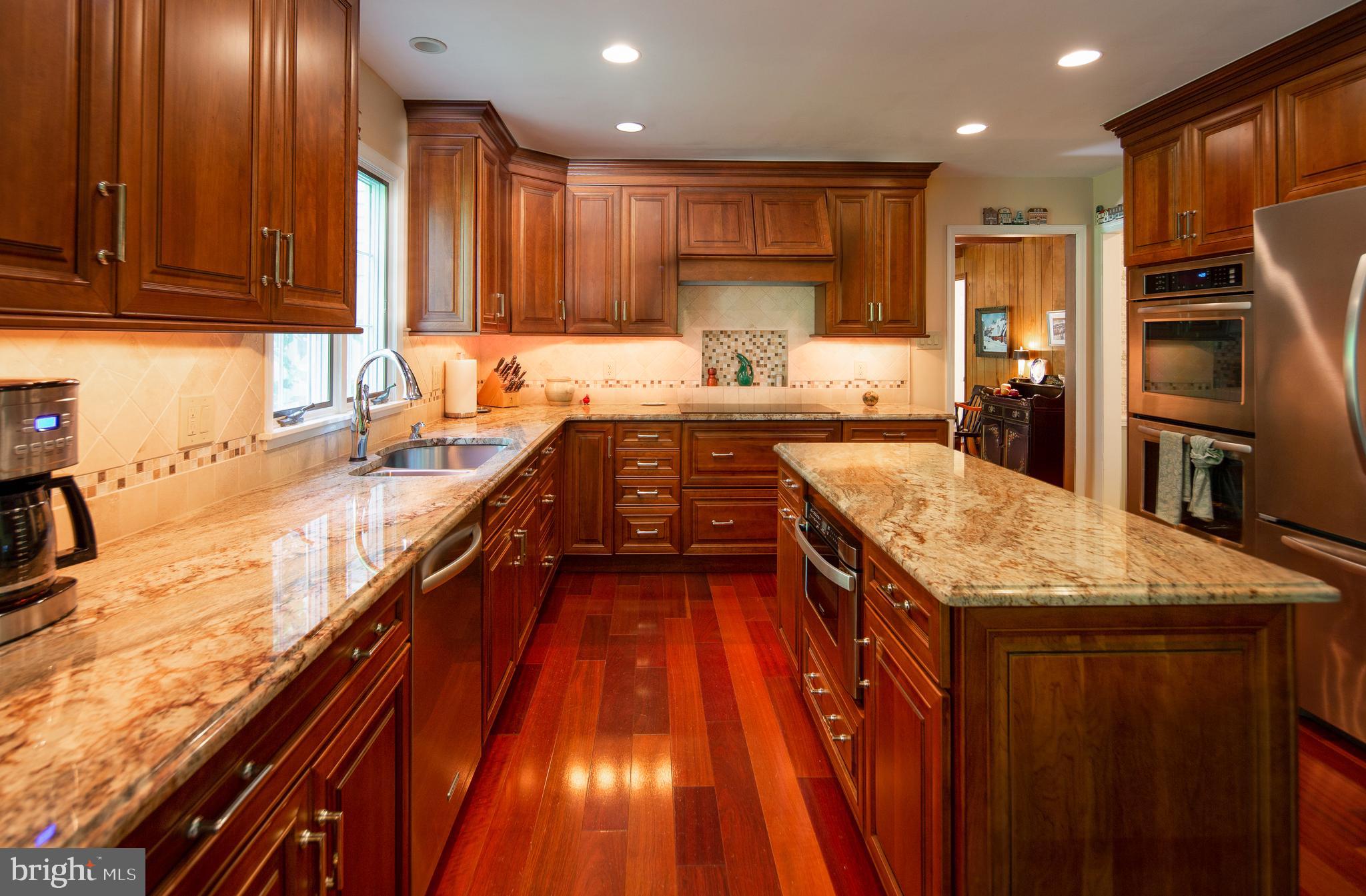 6996 Ely Road New Hope, PA 18938 - Photo 7 of 24 Granite Counter Tops And Cherry Cabinets