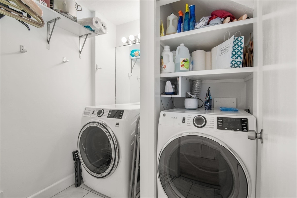 66 Glades Road, Unit 8 Scituate, MA 02066 - Photo 23 of 27 a utility room with dryer and washer