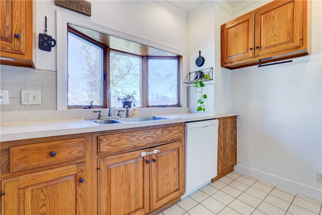 134 Wyndham Road Rochester, NY 14612 - Photo 11 of 31 Kitchen features the all important dishwasher.