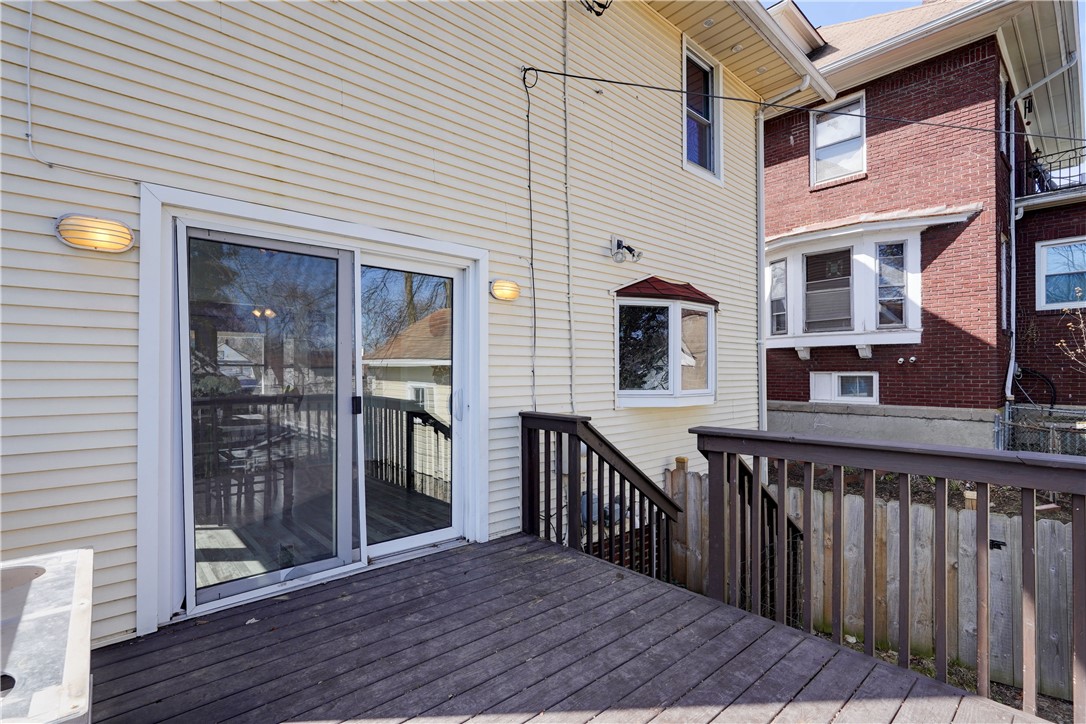 134 Wyndham Road Rochester, NY 14612 - Photo 27 of 31 Sliding glass door onto the deck.