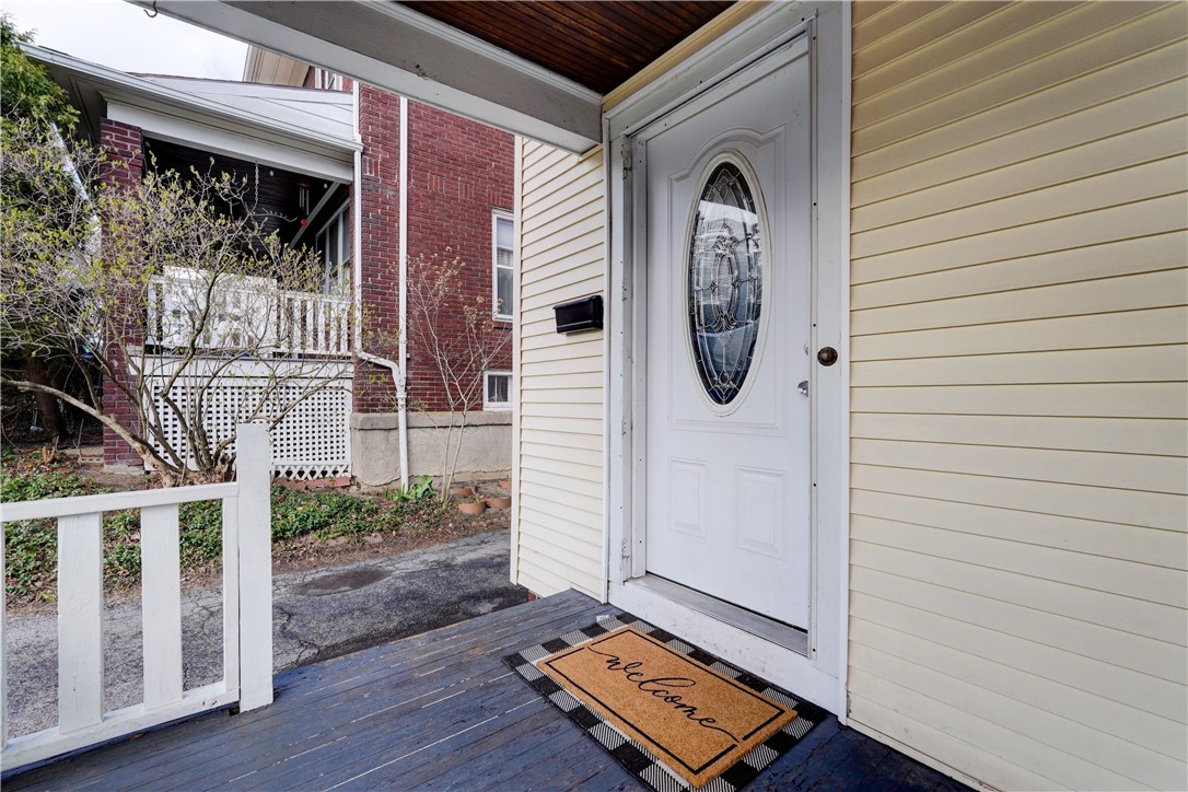 134 Wyndham Road Rochester, NY 14612 - Photo 3 of 31 Front entry protected from the weather.