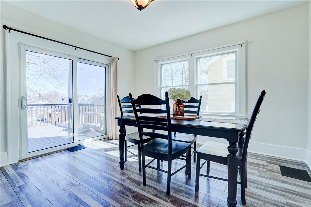 134 Wyndham Road Rochester, NY 14612 - Photo 8 of 31 Dining room with sliding glass doors to the deck.