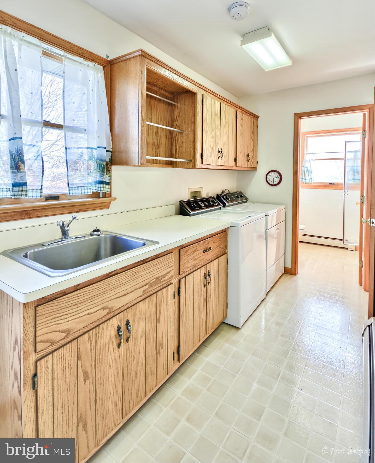 8021 Rocky Springs Road Frederick, MD 21702 - Photo 12 of 30 a kitchen with stainless steel appliances granite countertop a sink and a cabinets