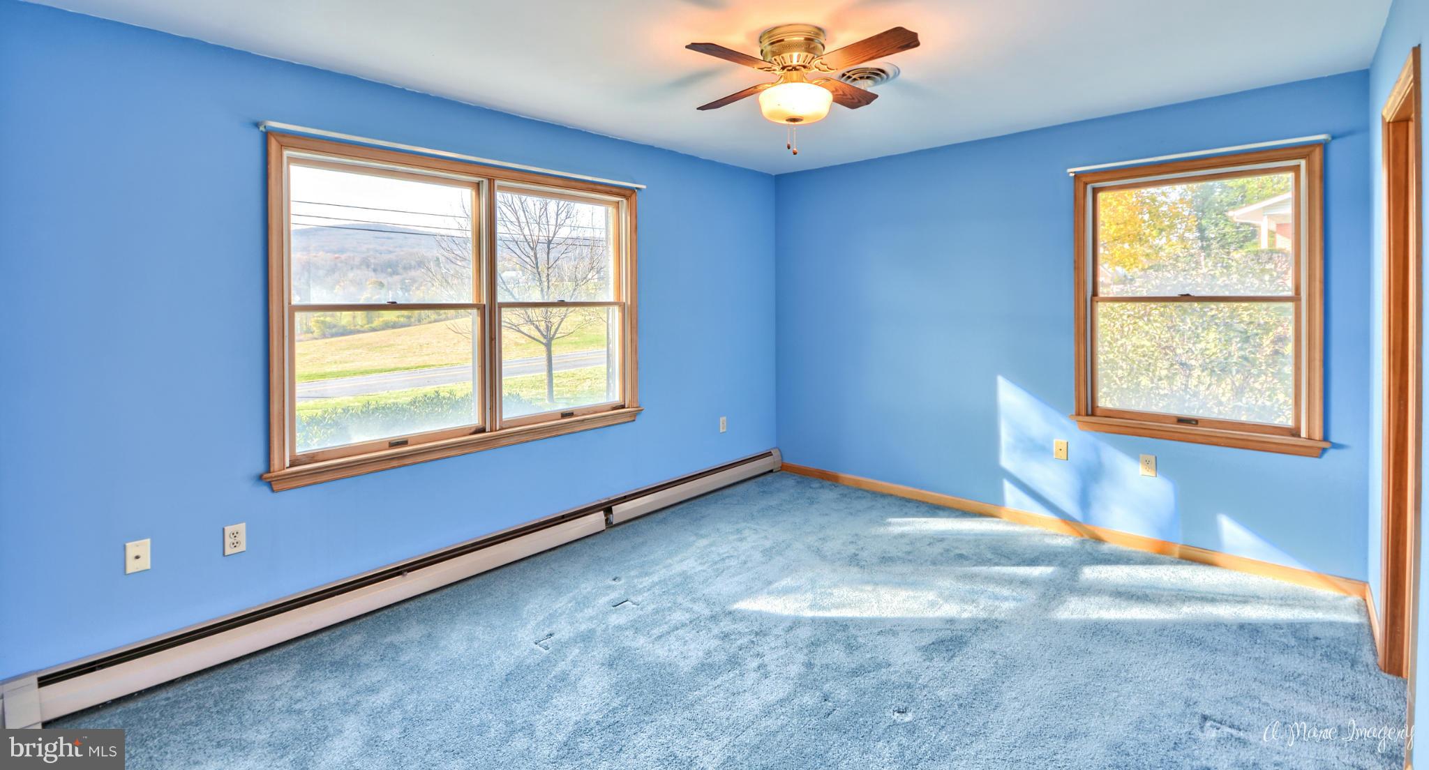 8021 Rocky Springs Road Frederick, MD 21702 - Photo 14 of 30 a view of an empty room with a window