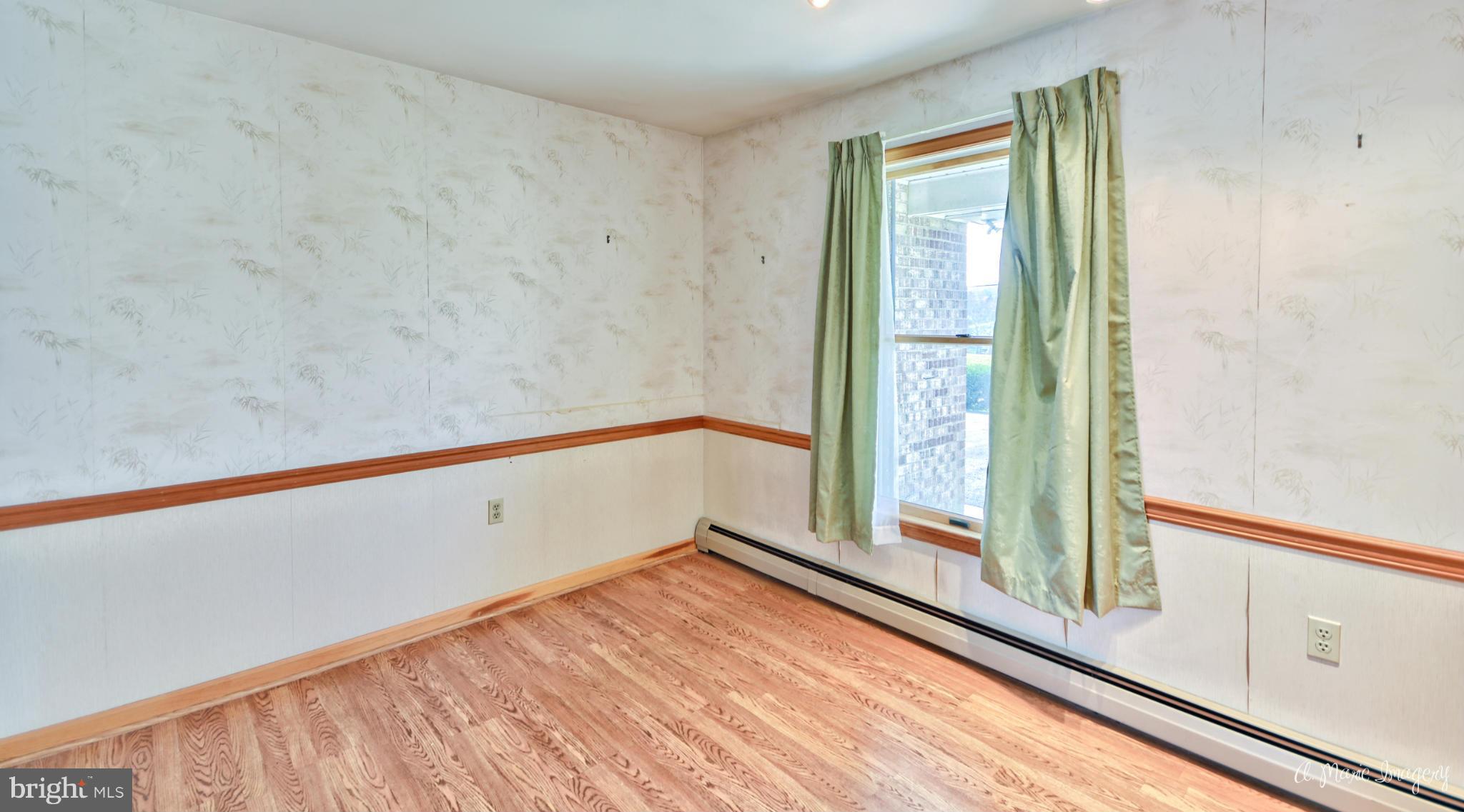 8021 Rocky Springs Road Frederick, MD 21702 - Photo 18 of 30 a view of an empty room and window