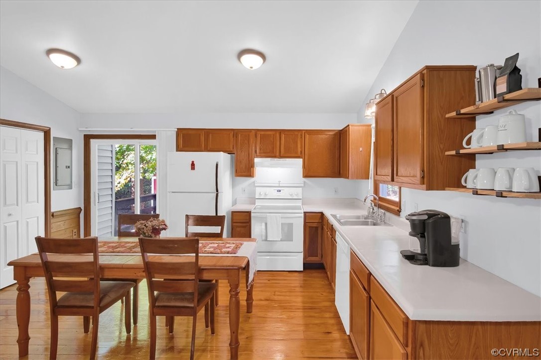 3350 Forest Grove Road Sandy Hook, VA 23153 - Photo 14 of 42 a living room with stainless steel appliances furniture a large window and a kitchen view
