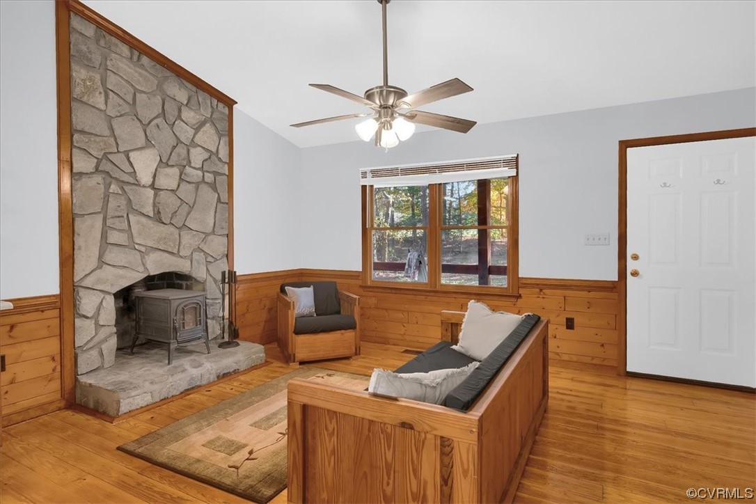 3350 Forest Grove Road Sandy Hook, VA 23153 - Photo 17 of 42 a living room with furniture and a fireplace