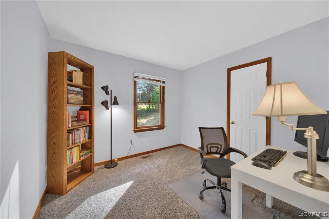 3350 Forest Grove Road Sandy Hook, VA 23153 - Photo 26 of 42 a view of a workspace with furniture and a window