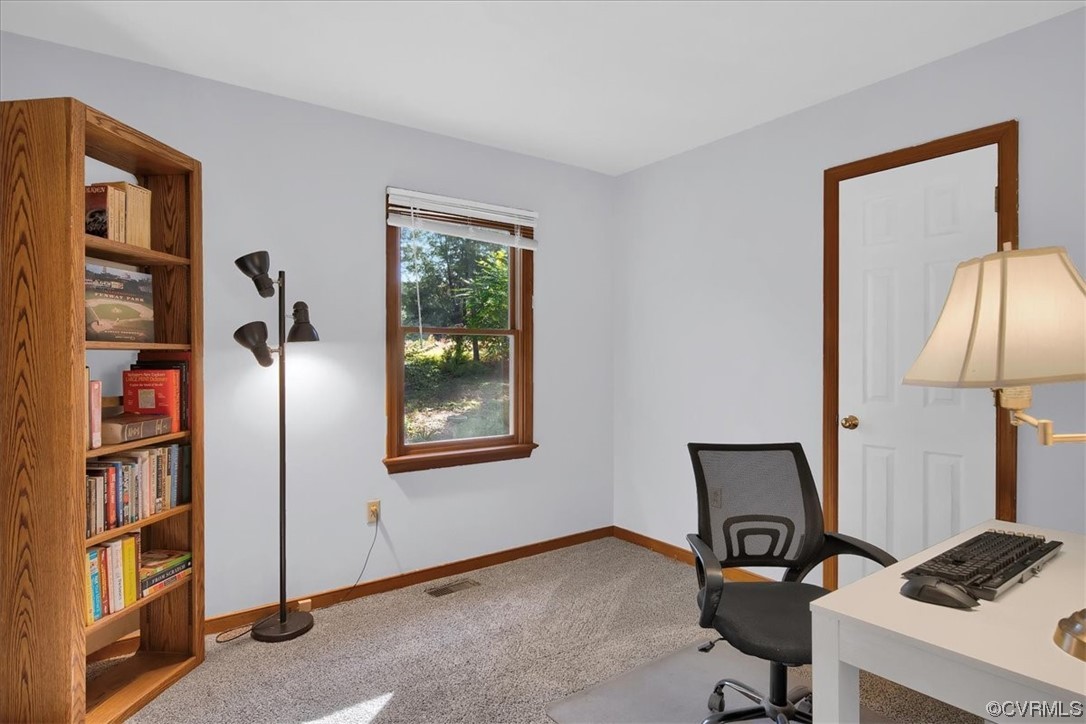 3350 Forest Grove Road Sandy Hook, VA 23153 - Photo 27 of 42 a view of a workspace with furniture and a window