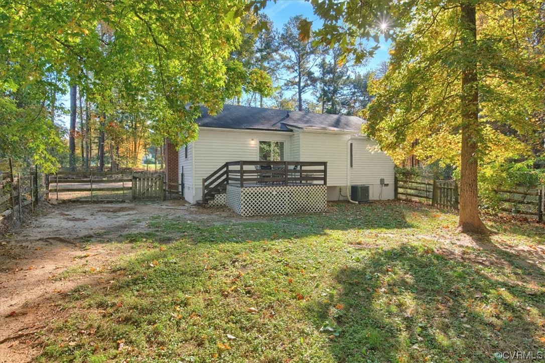 3350 Forest Grove Road Sandy Hook, VA 23153 - Photo 29 of 42 a front view of a house with a yard