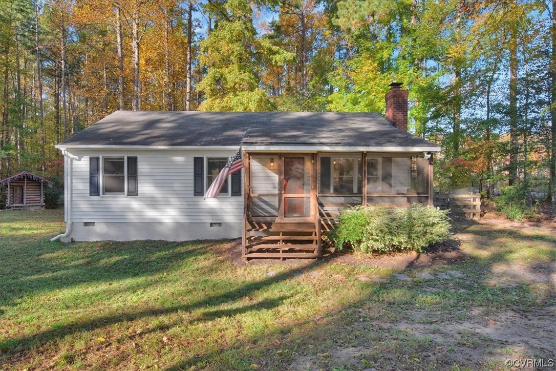 3350 Forest Grove Road Sandy Hook, VA 23153 - Photo 3 of 42 a house view with a garden space