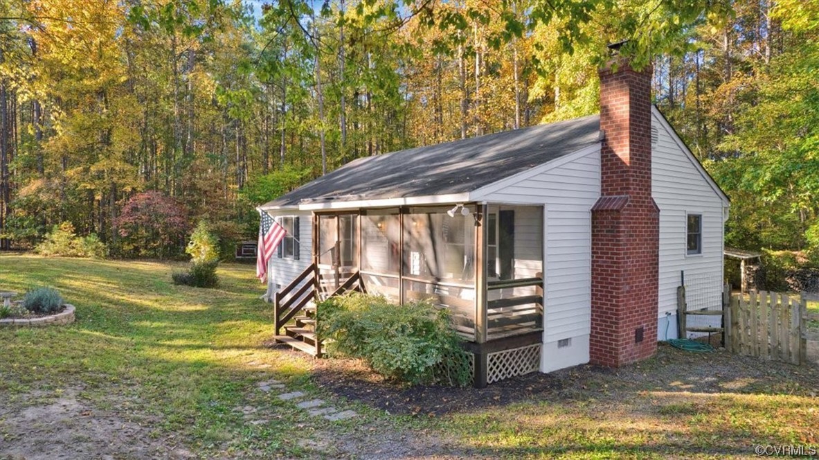 3350 Forest Grove Road Sandy Hook, VA 23153 - Photo 4 of 42 a view of a house with backyard