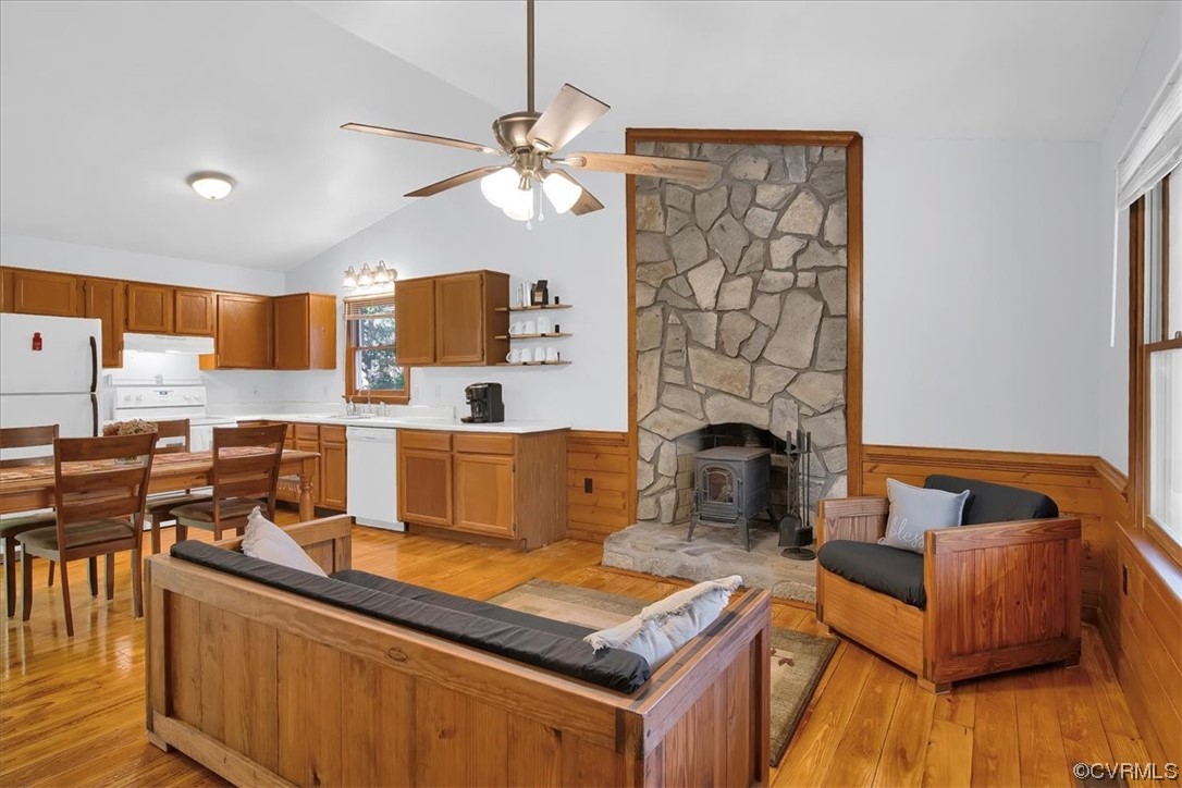 3350 Forest Grove Road Sandy Hook, VA 23153 - Photo 8 of 42 a living room with fireplace furniture and a wooden floor