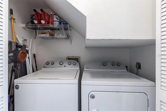 a utility room with dryer and washer