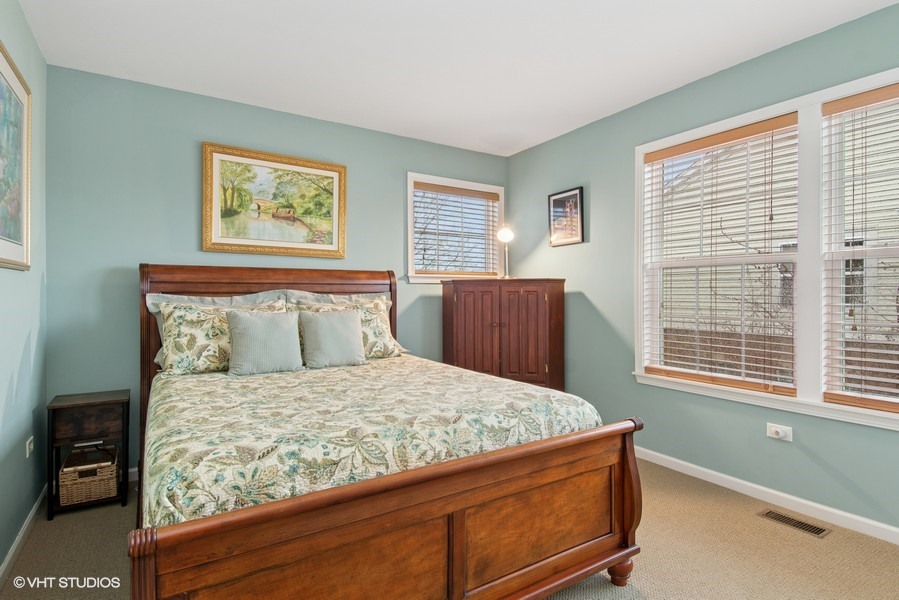 2846 Normandy Circle Naperville, IL 60564 - Photo 20 of 44 a bedroom with a bed and a window