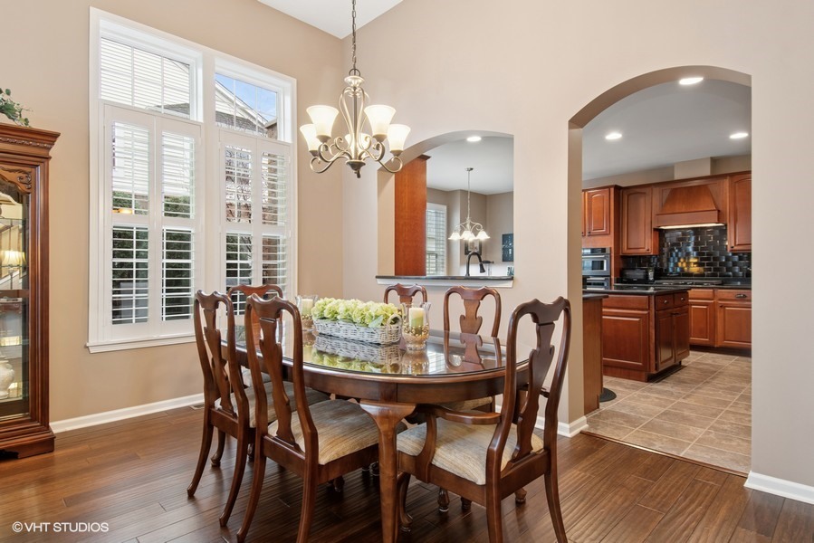 2846 Normandy Circle Naperville, IL 60564 - Photo 6 of 44 a view of a dining room with furniture window and wooden floor