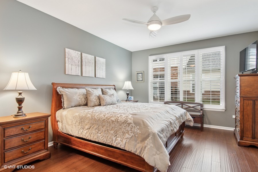 2846 Normandy Circle Naperville, IL 60564 - Photo 10 of 44 a bedroom with a large bed and a large window