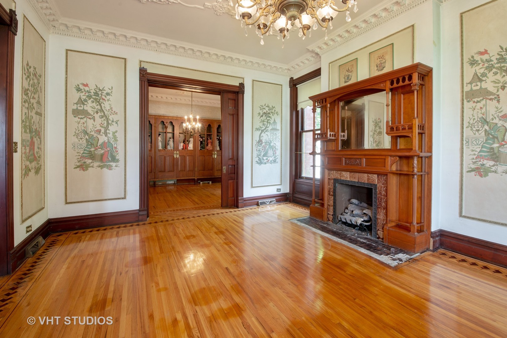 307 North Main Street Sycamore, IL 60178 - Photo 12 of 32 an empty room with wooden floor fireplace and windows