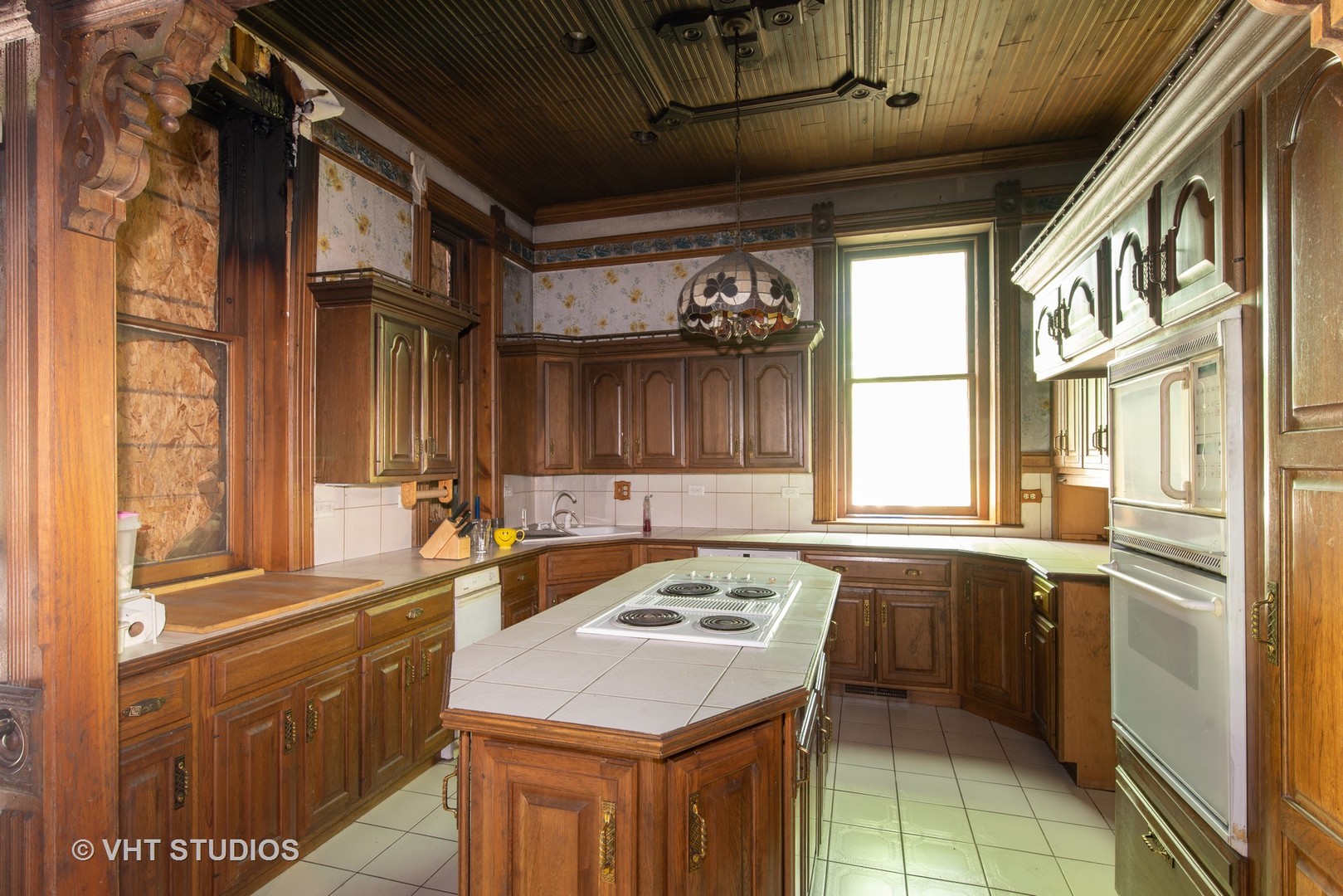 307 North Main Street Sycamore, IL 60178 - Photo 15 of 32 a kitchen with a sink stove and cabinets