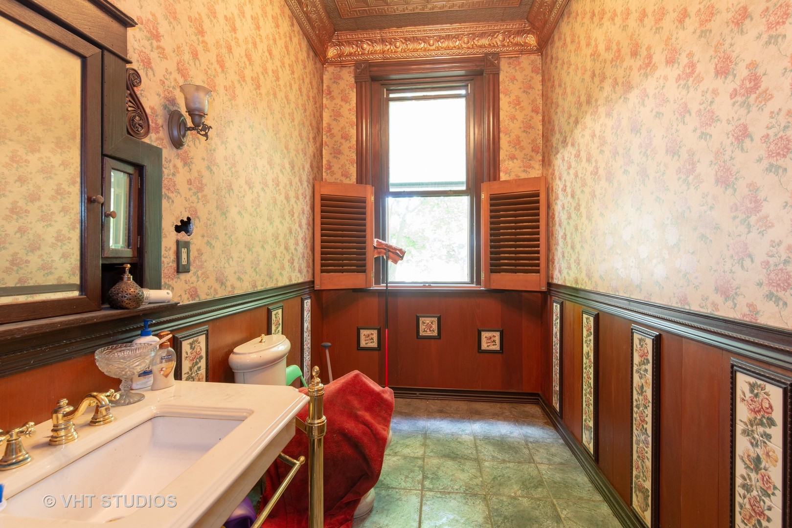 307 North Main Street Sycamore, IL 60178 - Photo 17 of 32 a view of a bathroom with a sink and a window