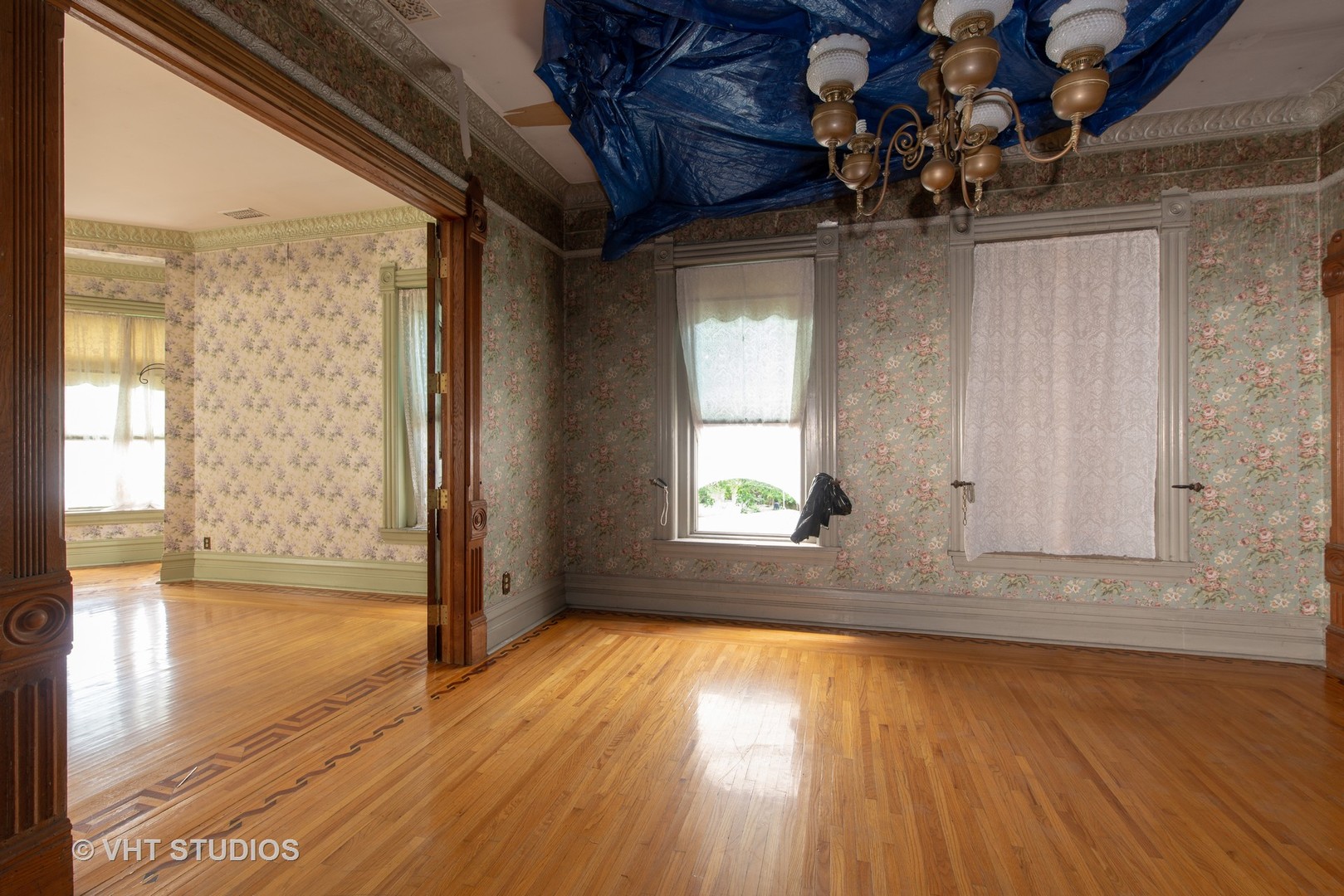 307 North Main Street Sycamore, IL 60178 - Photo 23 of 32 a view of empty room with wooden floor and fan