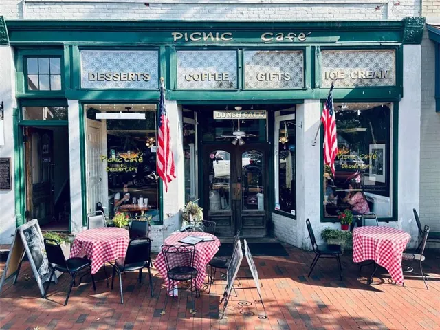 a view of a chairs and tables in patio
