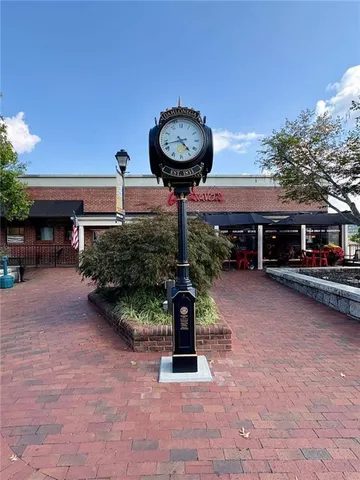 a view of path along with retail shop