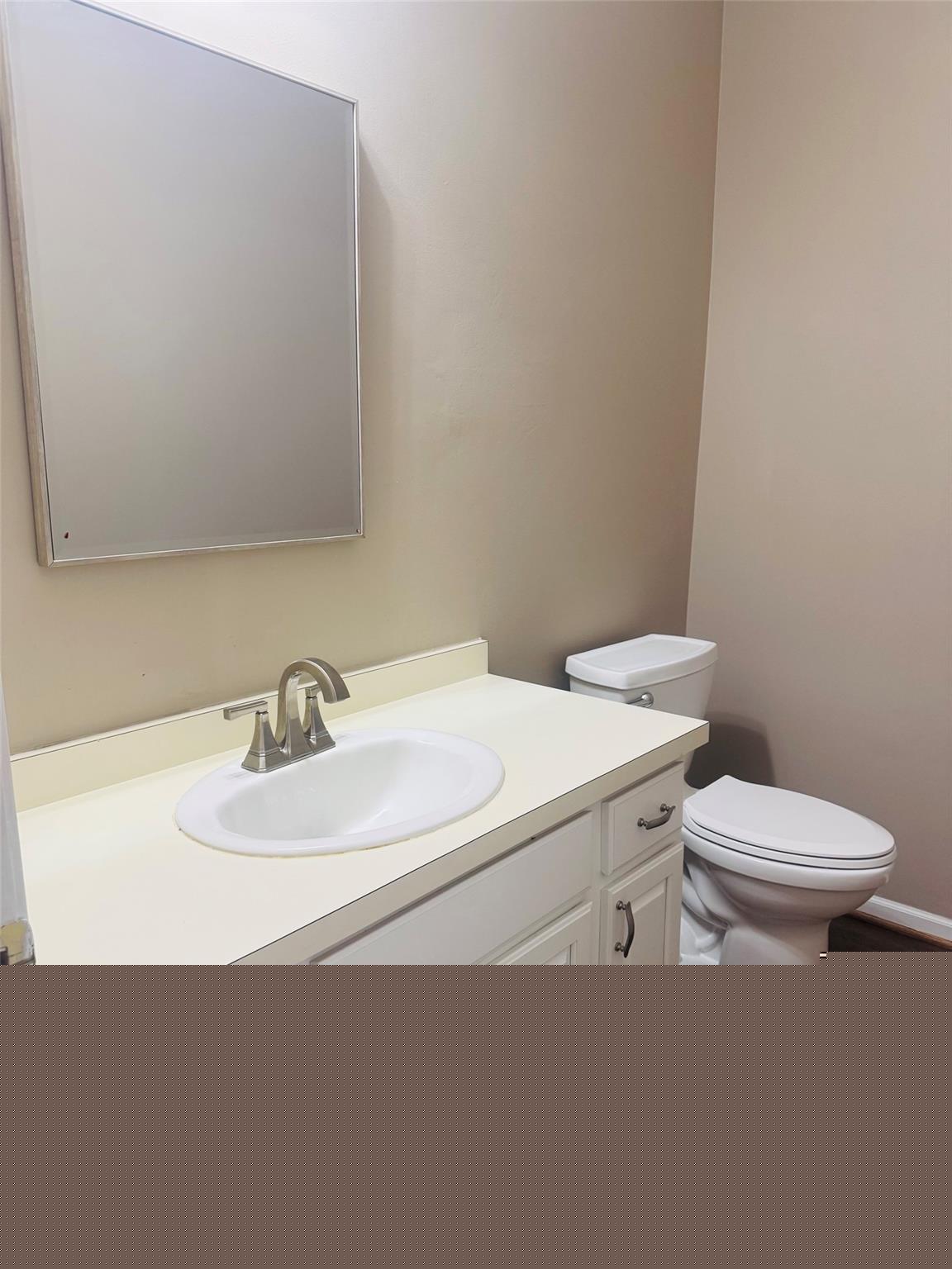 171 Millstone Road Troy, MI 48084 - Photo 28 of 43 First floor bath with hardwood floors