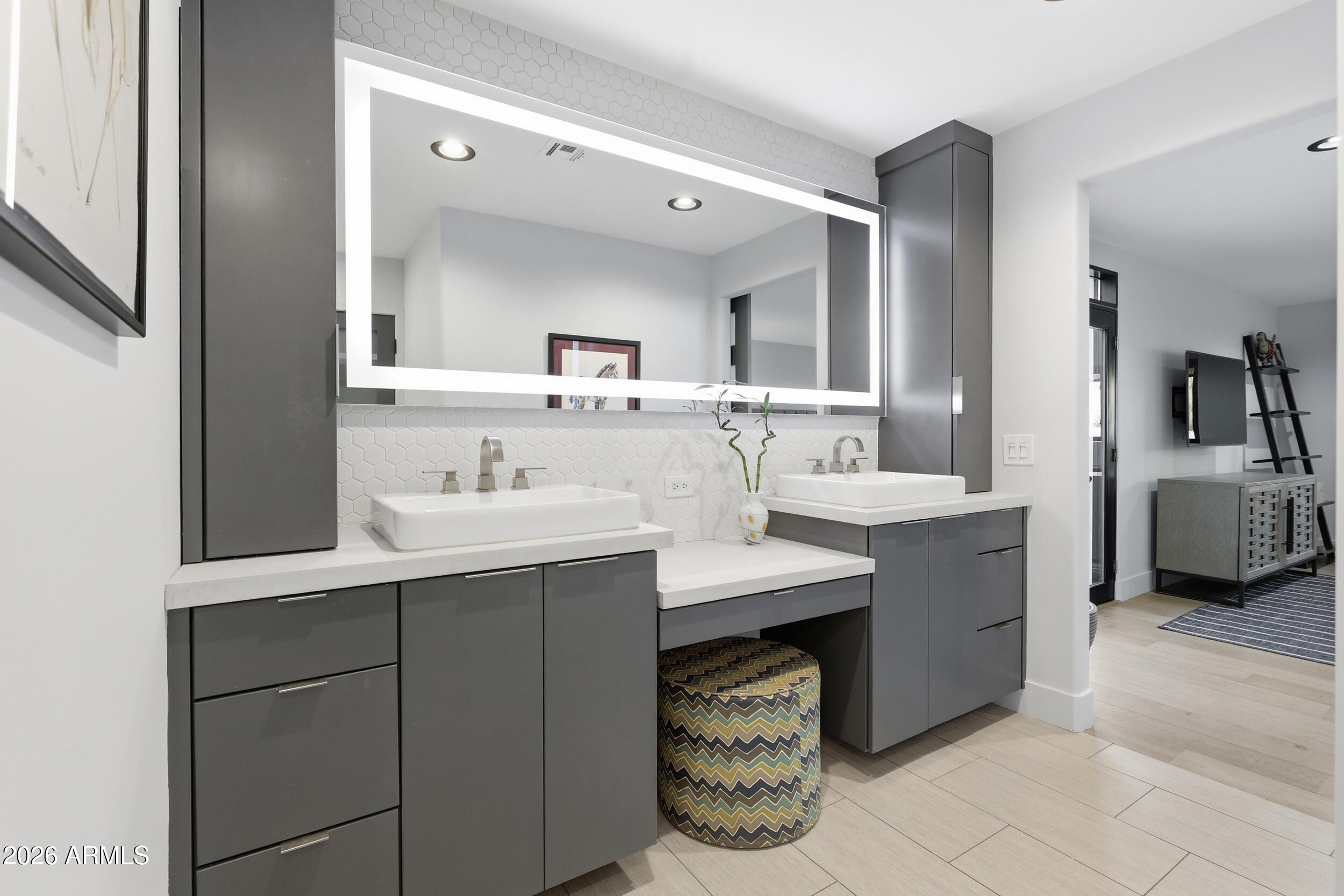 4417 East Mountain View Road Phoenix, AZ 85028 - Photo 22 of 41 a bathroom with a sink double vanity and a mirror
