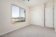 23175 West Skinner Road Wittmann, AZ 85361 - Photo 25 of 35 an empty room with a window