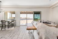 23175 West Skinner Road Wittmann, AZ 85361 - Photo 8 of 35 a living room with furniture and large windows