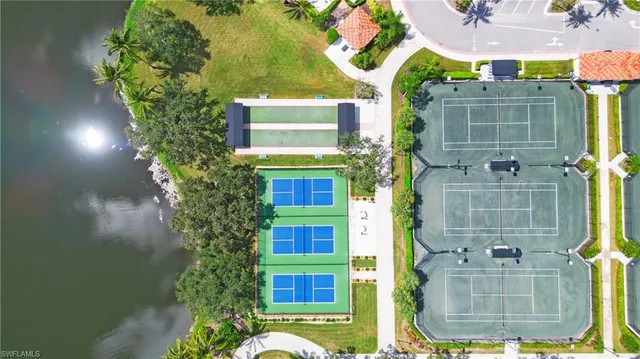 a view of a brick building next to a yard