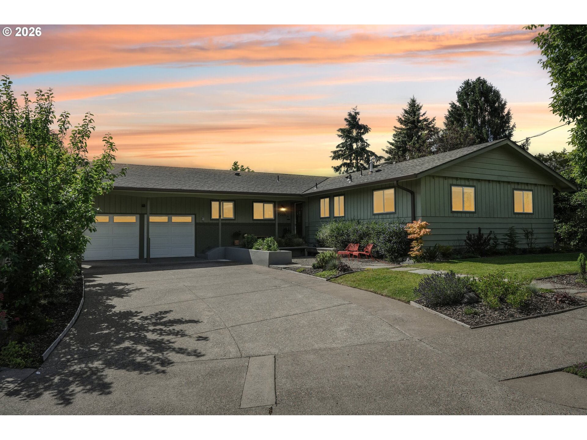 7225 Southwest 13th Avenue Portland, OR 97219 - Photo 48 of 48 a front view of a house with a garden and patio