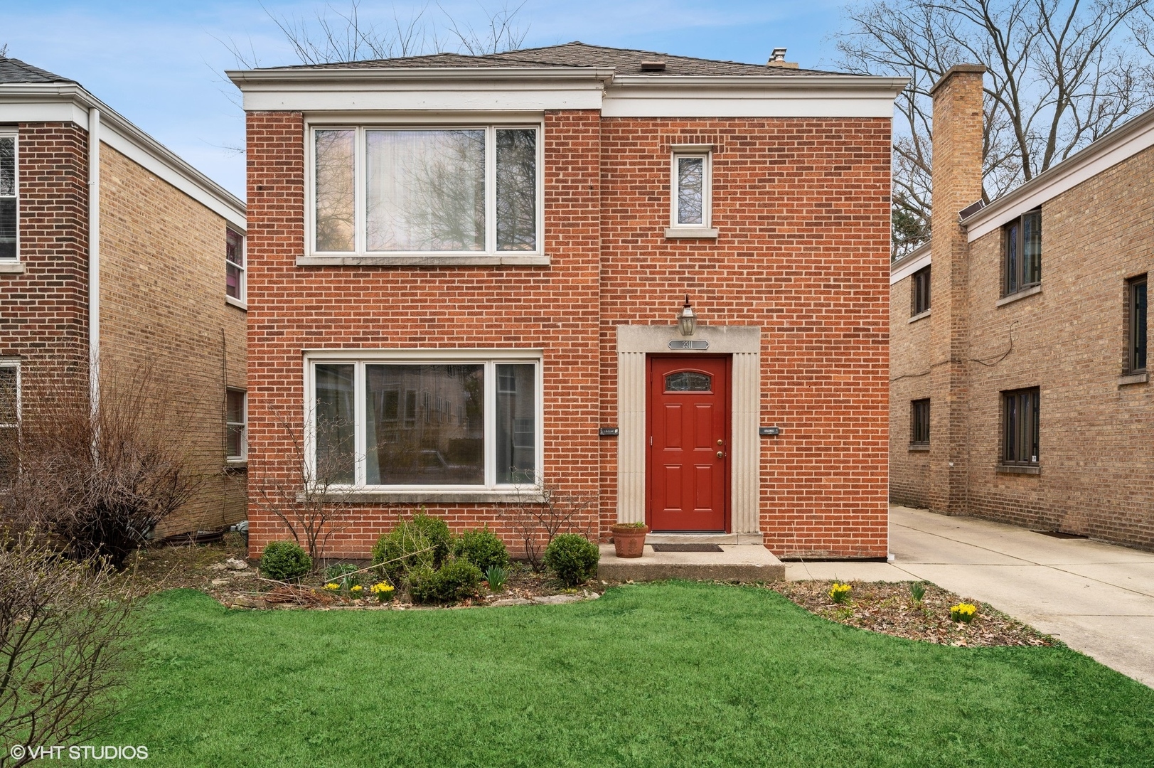 2311 Brown Avenue, Unit 1 Evanston, IL 60201 - Photo 2 of 13 front view of a house with a yard