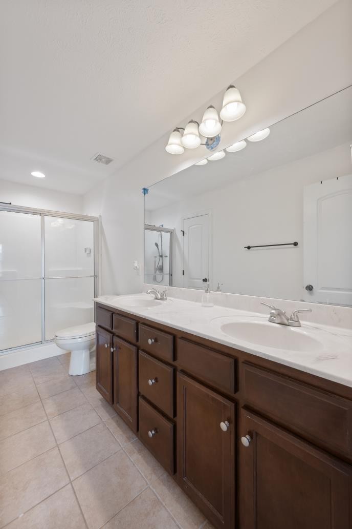 16 Andy Circle Lebanon, TN 37087 - Photo 16 of 25 a bathroom with a double vanity sink and a mirror