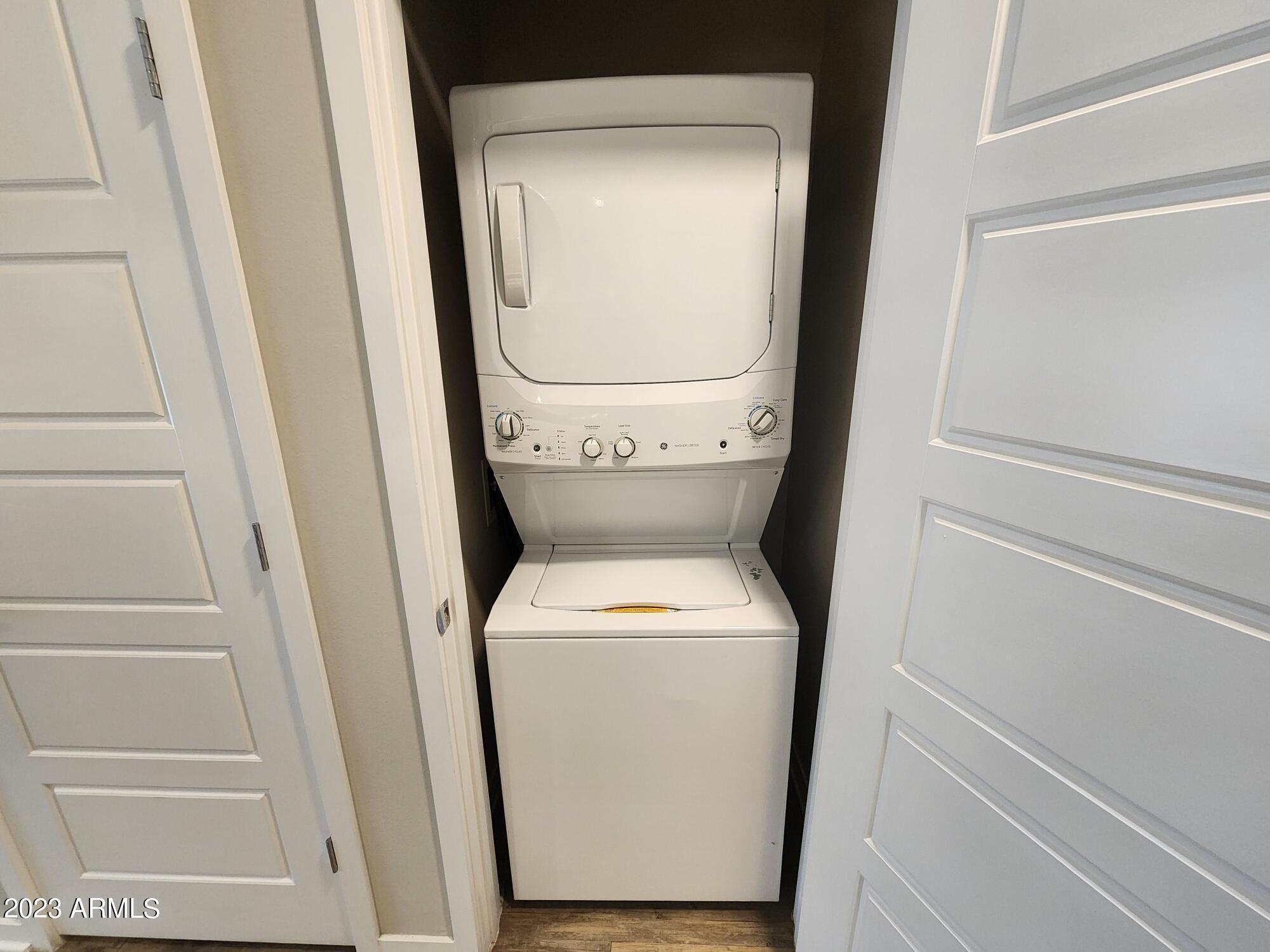 200 East Thomas Road, Unit A1 Phoenix, AZ 85012 - Photo 9 of 26 a utility room with dryer and washer